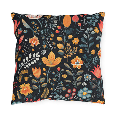 Floral-patterned pillow with colorful flowers on a black background